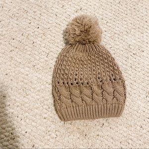 Winter hat/beanie with pom pom.